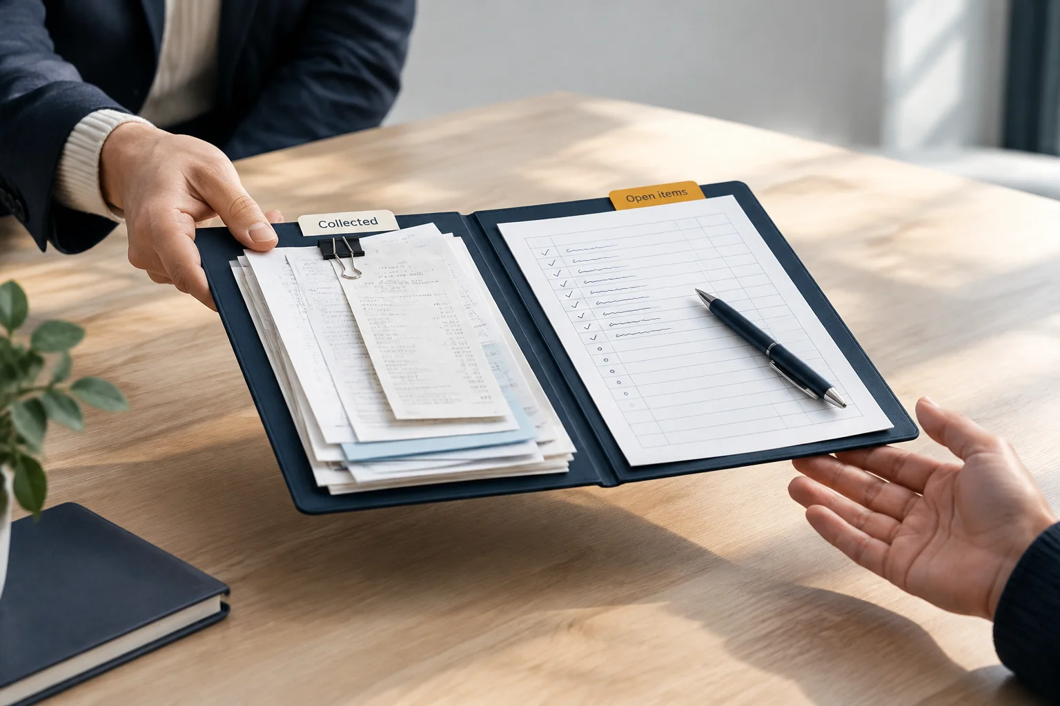 Two hands pass an open folder holding receipts and a review sheet, with tabs marked Collected and Open items.